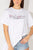 DISCLAIMER T-shirt asimmetrica con paillettes frontali