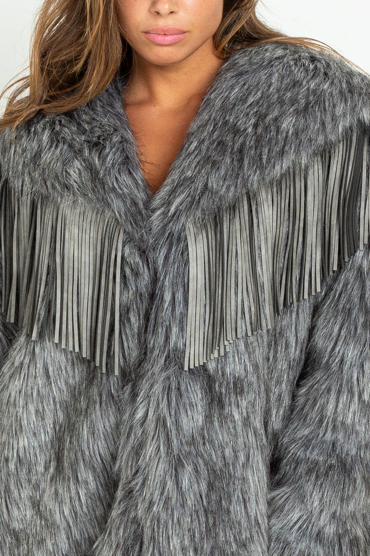 Pelliccia eco-fur con frange