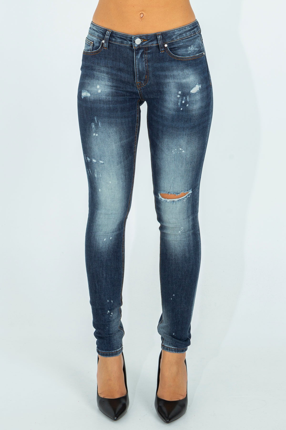 Jeans skinny con rotture