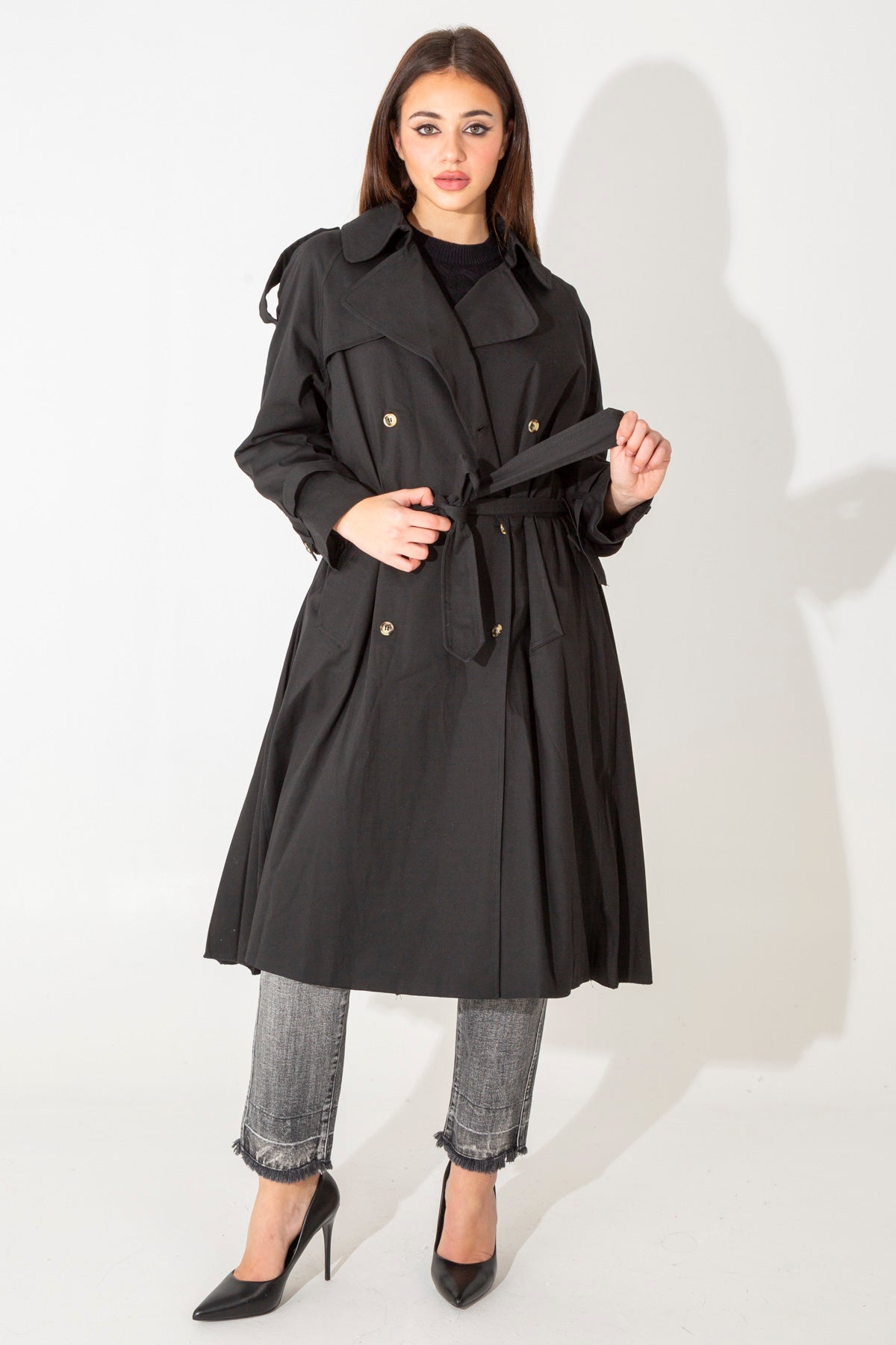 Trench coat with pleats